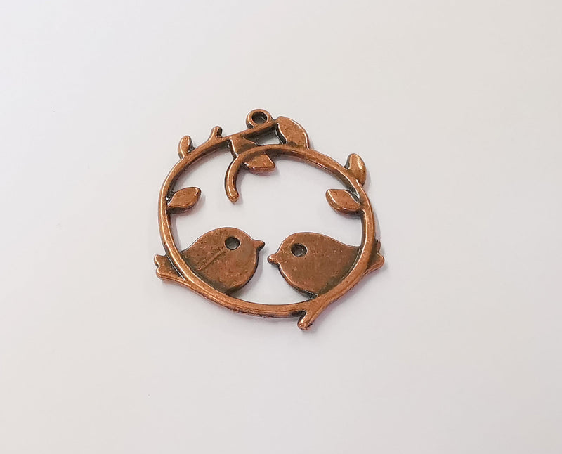 2 Bird branch charms Antique copper plated charms (42x38mm) G23916