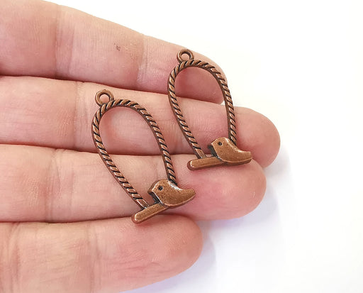 4 Bird charms Antique copper plated charms (36x17mm) G23918