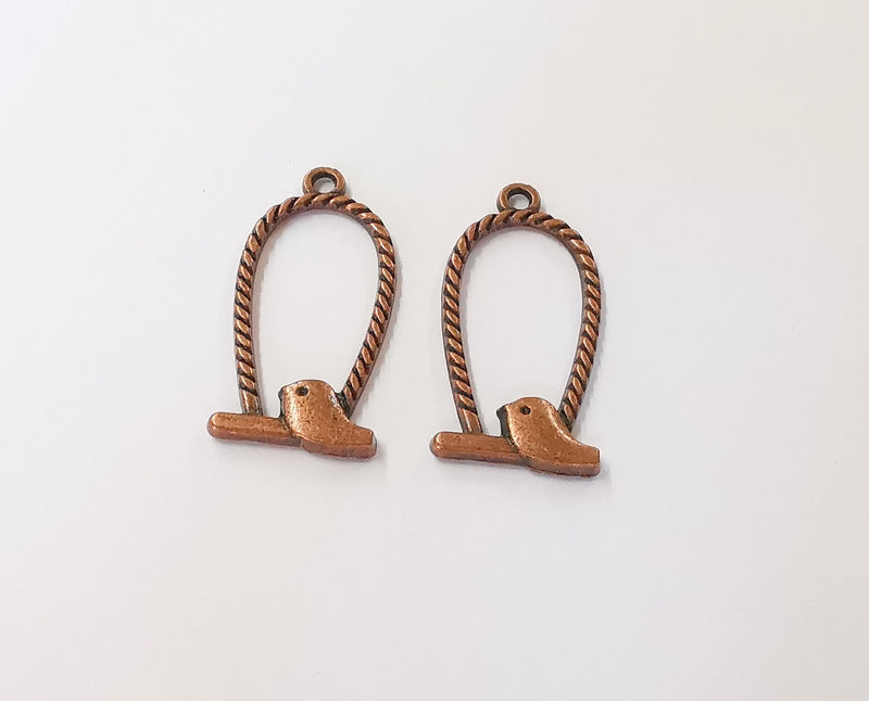 4 Bird charms Antique copper plated charms (36x17mm) G23918