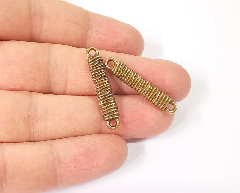 4 Connector charms Antique bronze plated charms (32x6mm) G23953