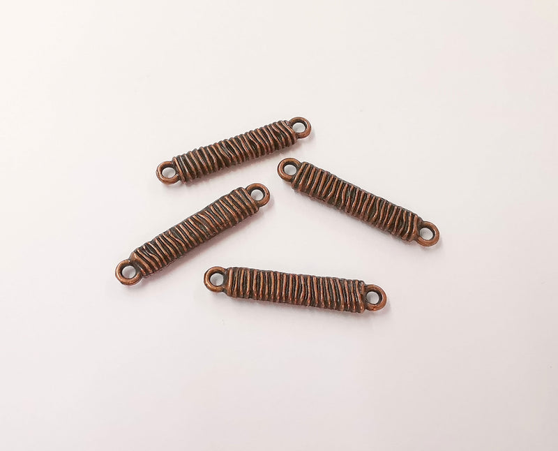 4 Connector charms Antique copper plated charms (32x6mm) G23972