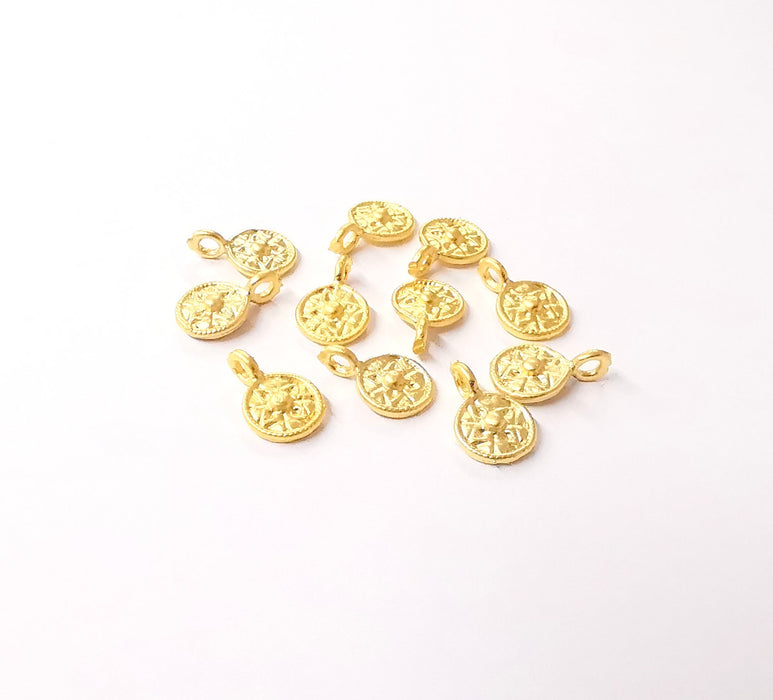 8 Gold plated small patterned charms Gold plated brass charms (13x8mm)  G24025