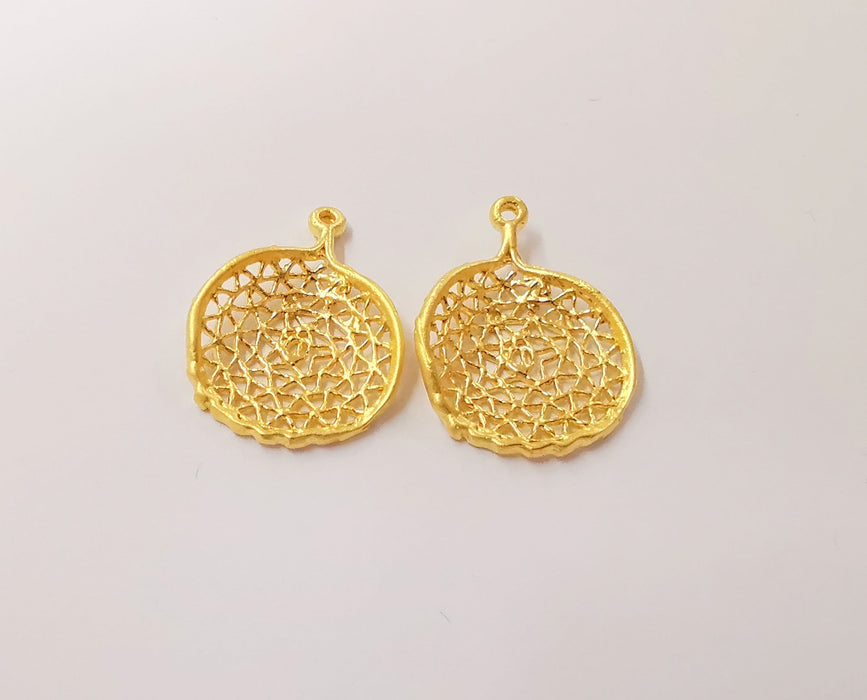 2 Circle charms with authentic motifs Gold plated brass charms (25x19mm)  G24056