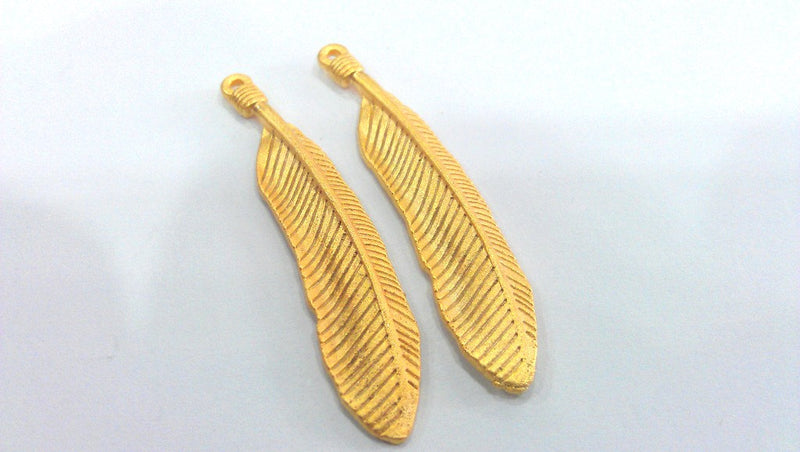 2 Feather Charm Gold Plated Brass Charms (45x8 mm.)  G686