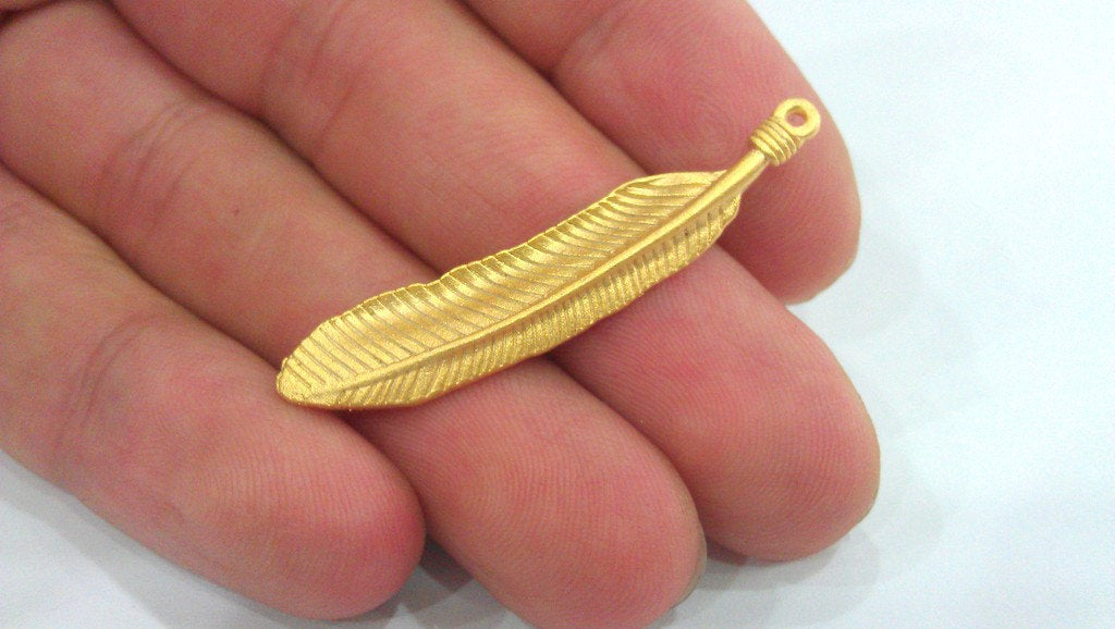 2 Feather Charm Gold Plated Brass Charms (45x8 mm.)  G686