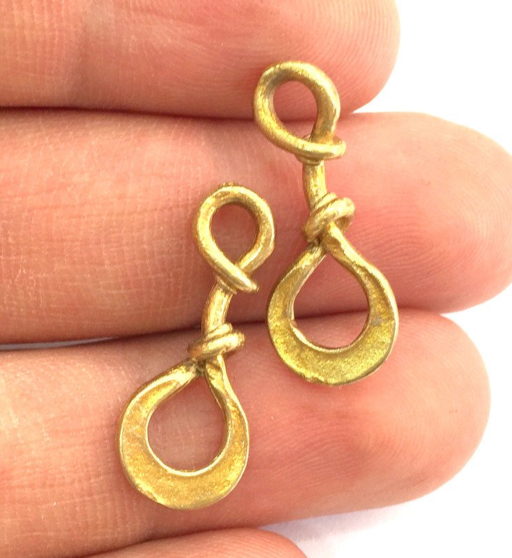 4 Raw Brass Knot Charms 18x13 mm G3399