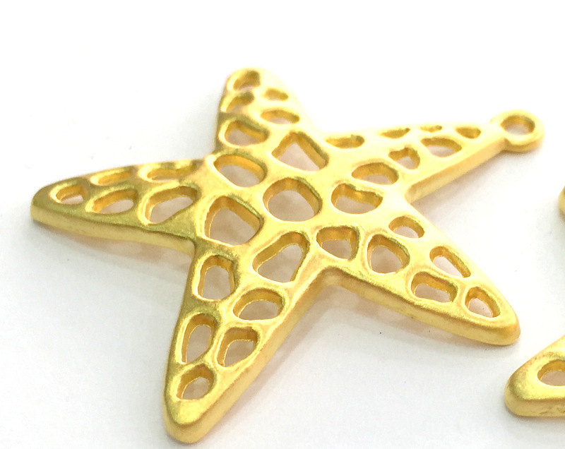 Gold Star Pendants , Gold Plated Metal (35 mm.)  G3614