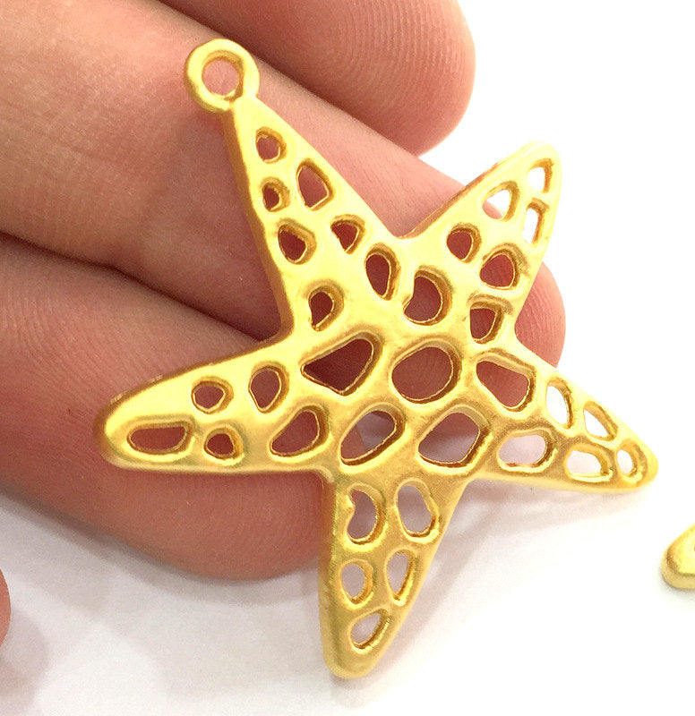 Gold Star Pendants , Gold Plated Metal (35 mm.)  G3614