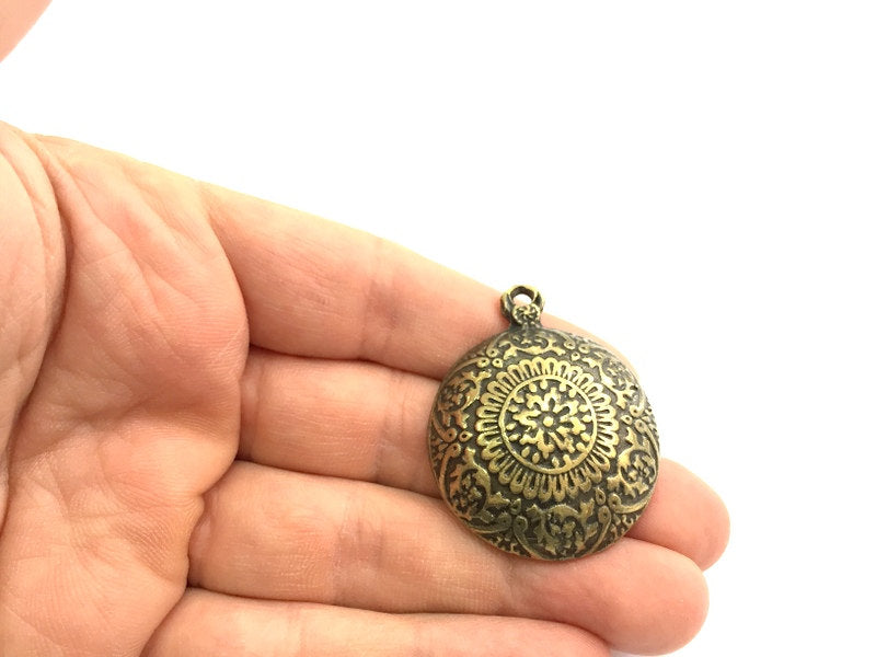 Antique Bronze  Metal Pendant (44x35 mm.)    G9785