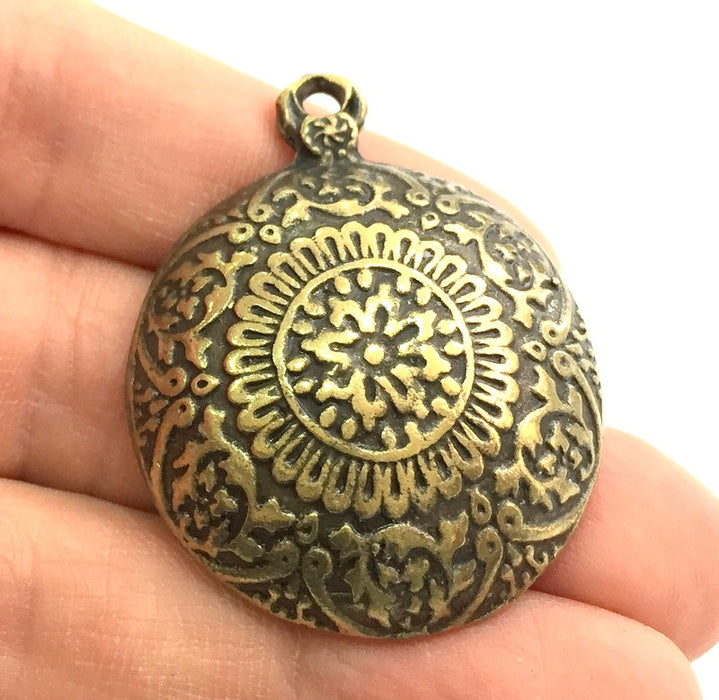 Antique Bronze  Metal Pendant (44x35 mm.)    G9785