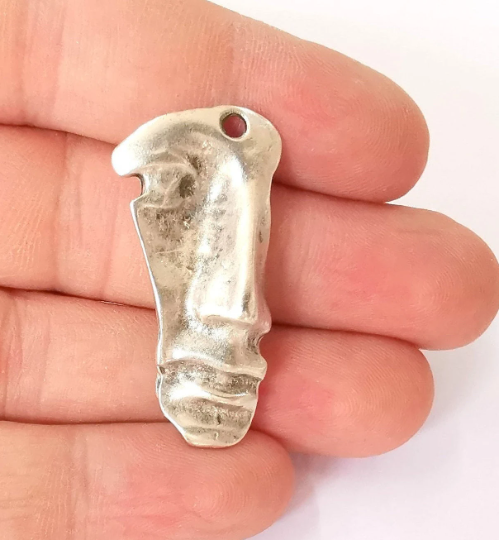 2 Antique silver face charms Silver plated charms (39x20mm) G23659