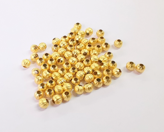 20 Ribbed beads Gold plated beads (4mm) G24437