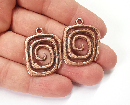 2 Swirl charms Antique copper plated charms (34x26mm) G25349